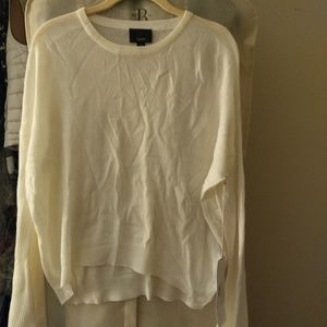 Soft white sweater with bell sleeves